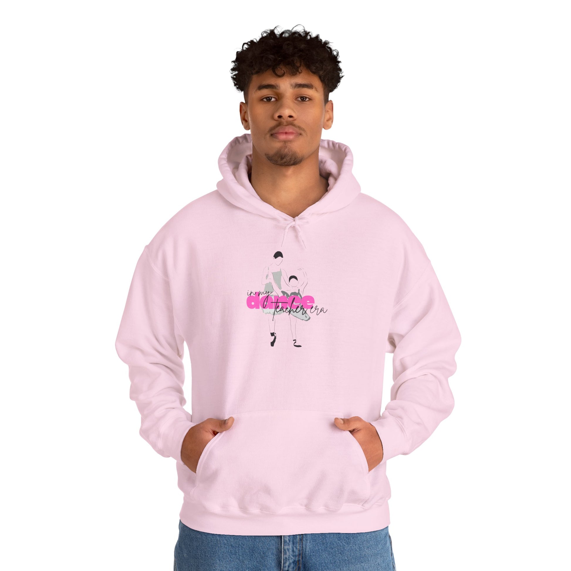 Person wearing a pink hoodie with a graphic design on a white background
