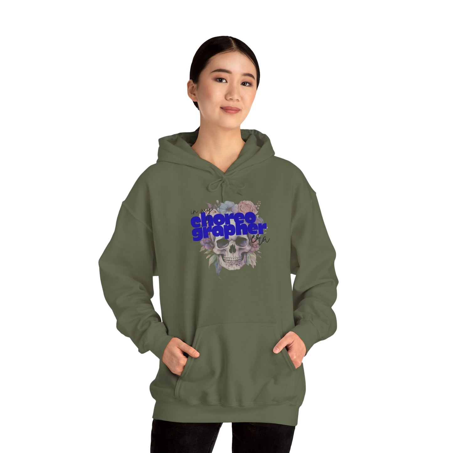 Person wearing a green hoodie with a graphic design on a white background