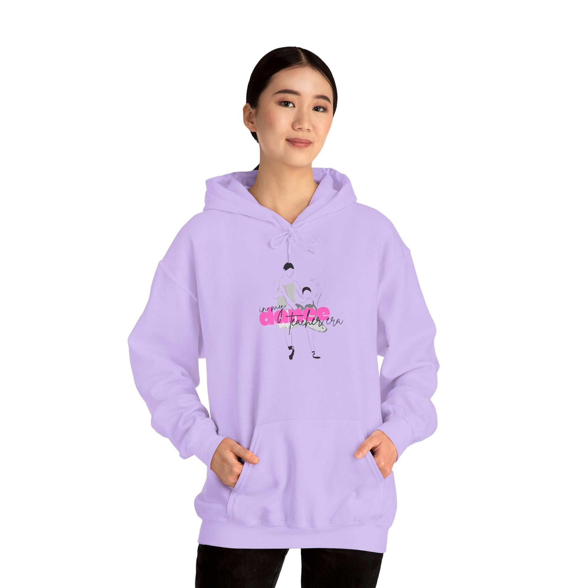 Person wearing a light purple hoodie with a graphic design on a white background