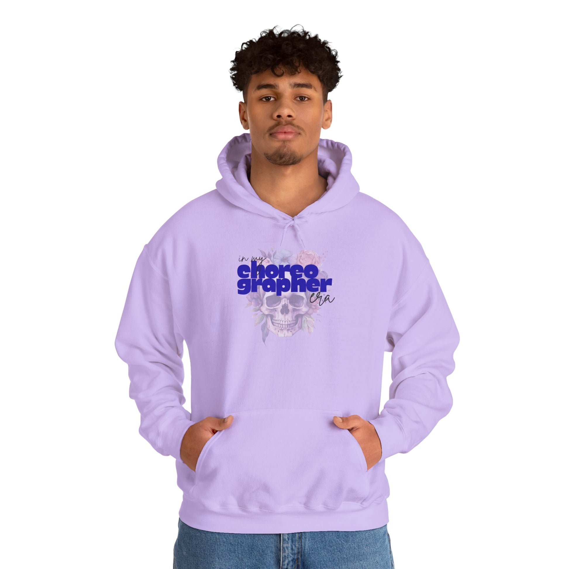 Person wearing a lavender hoodie with text and graphics on a white background
