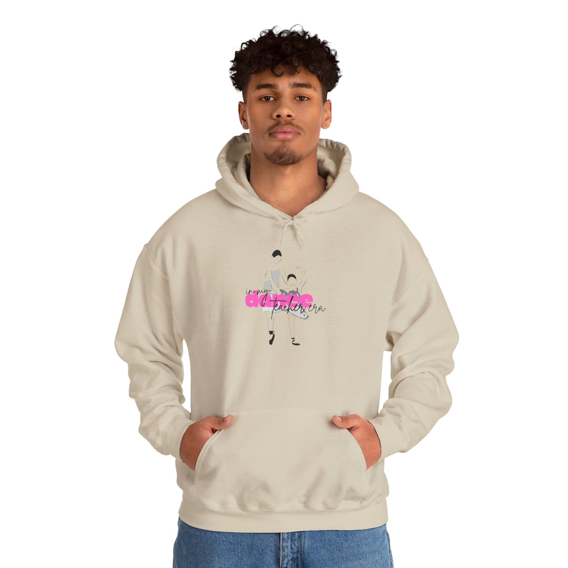 Person wearing a beige hoodie with a graphic design on a white background