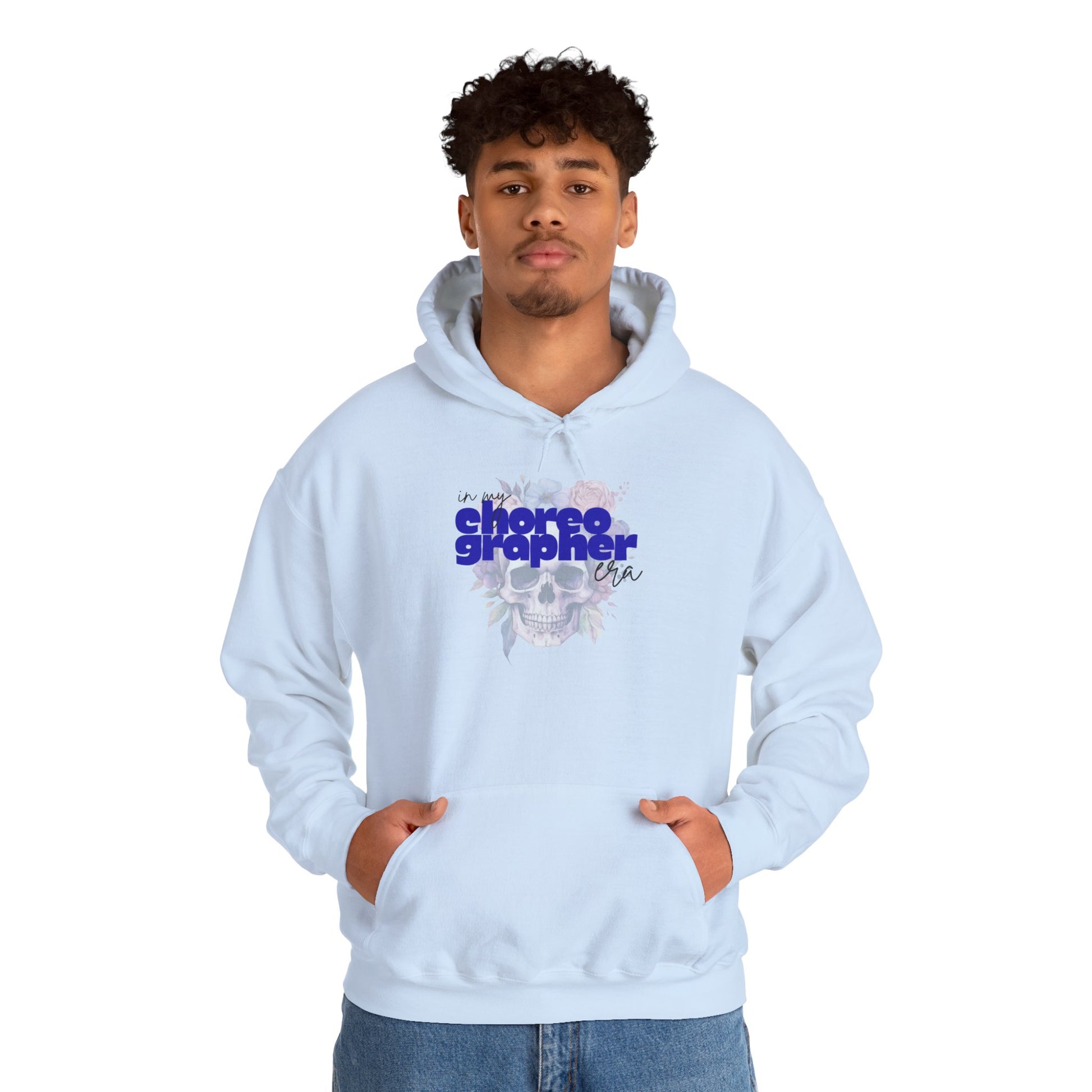 Person wearing a light blue hoodie with text and graphics on a white background