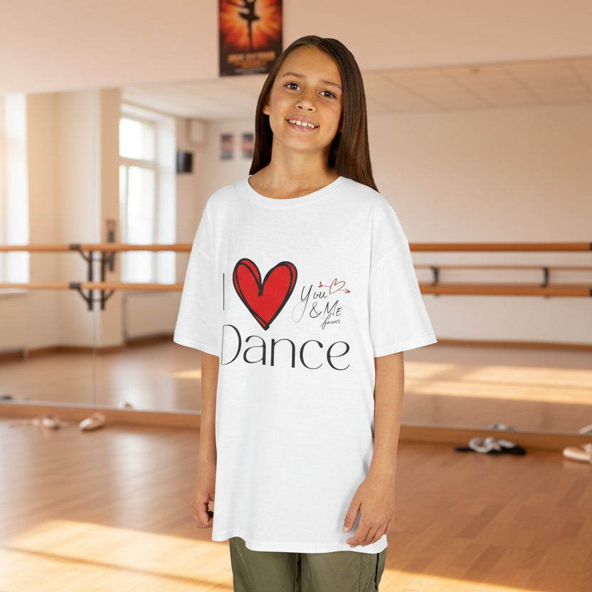 Young girl wearing a white t-shirt with a red heart and text design 