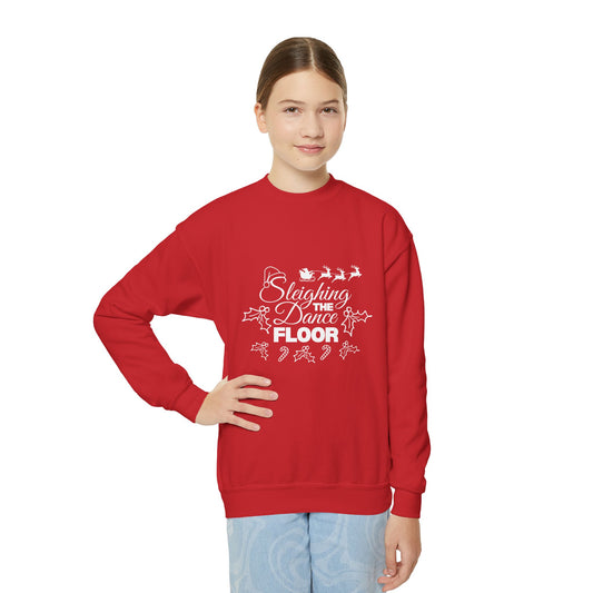 Person wearing a red sweatshirt with text and graphics on a white background
