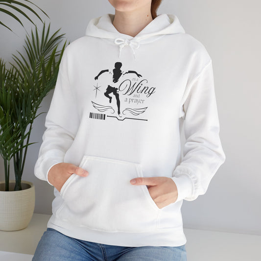 "On a Wing and a Prayer" Tap Dance Hoodie – Unisex Heavy Blend™ Hooded Sweatshirt with Streetwear-Inspired One-Footed Wing Dancer Graphic