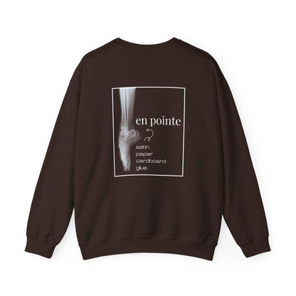 Brown sweatshirt with a graphic and text on the back against a white background