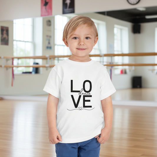Child wearing a white t-shirt with 'LOVE' printed on it against a white background