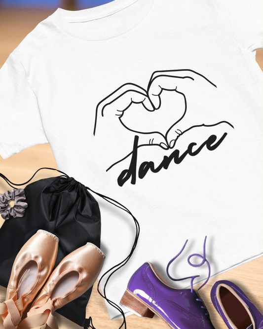 A t-shirt with an outline of two hands forming a heart with the word "dance" beneath it